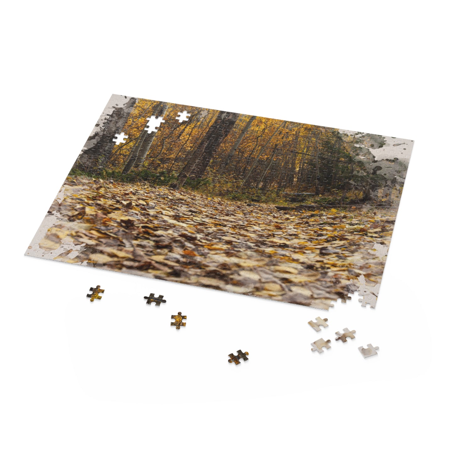 Forest-themed puzzle showcasing an artistic watercolor design of leaves on a peaceful woodland floor.