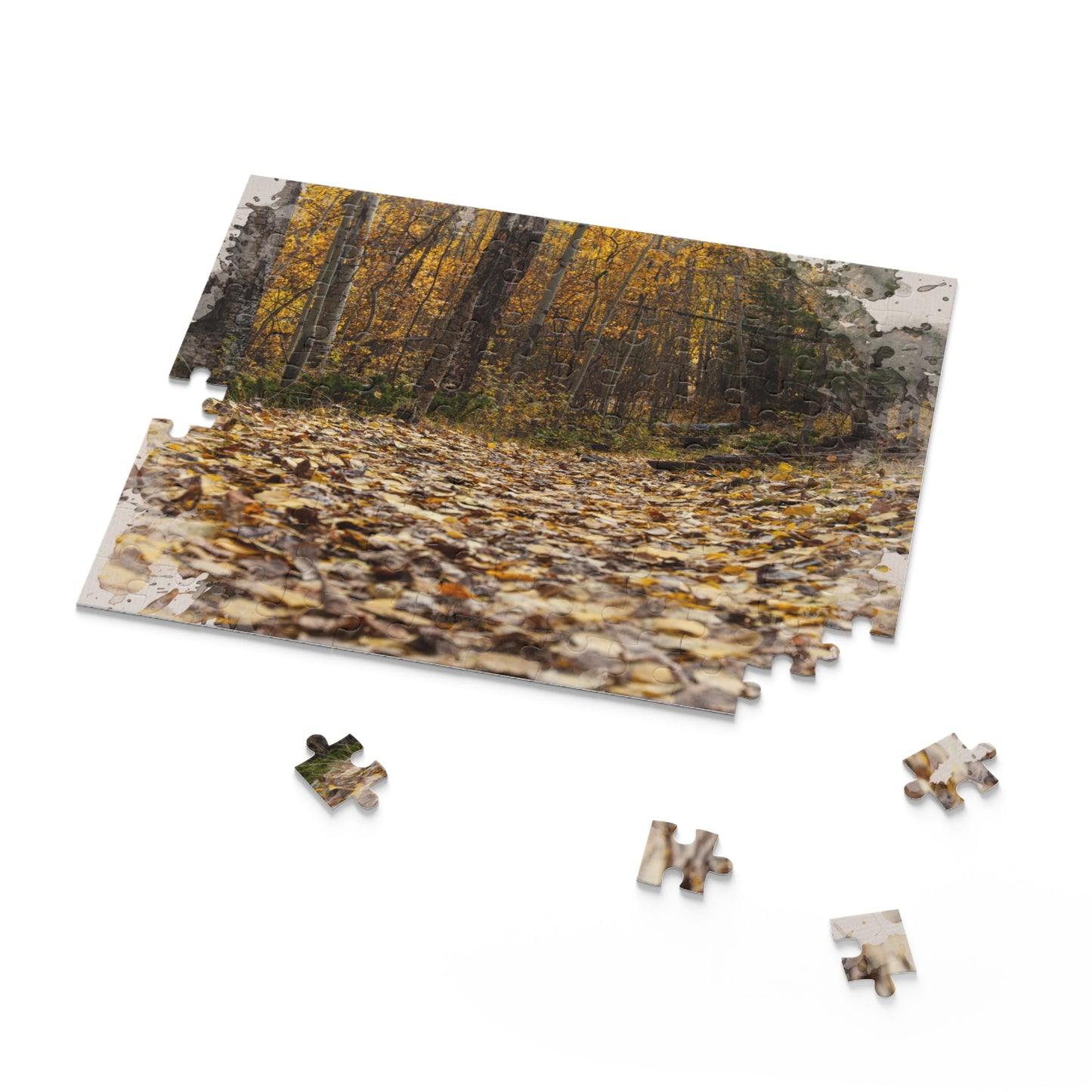 Forest-themed puzzle showcasing an artistic watercolor design of leaves on a peaceful woodland floor.